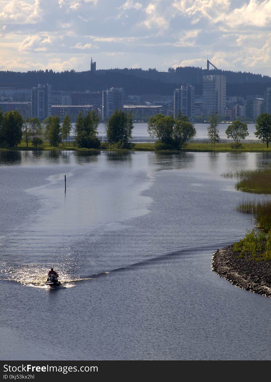 Person Riding Personal Watercraft