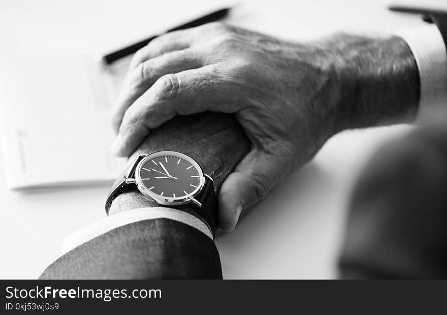 Person Wearing Round Silver-colored Analog Watch