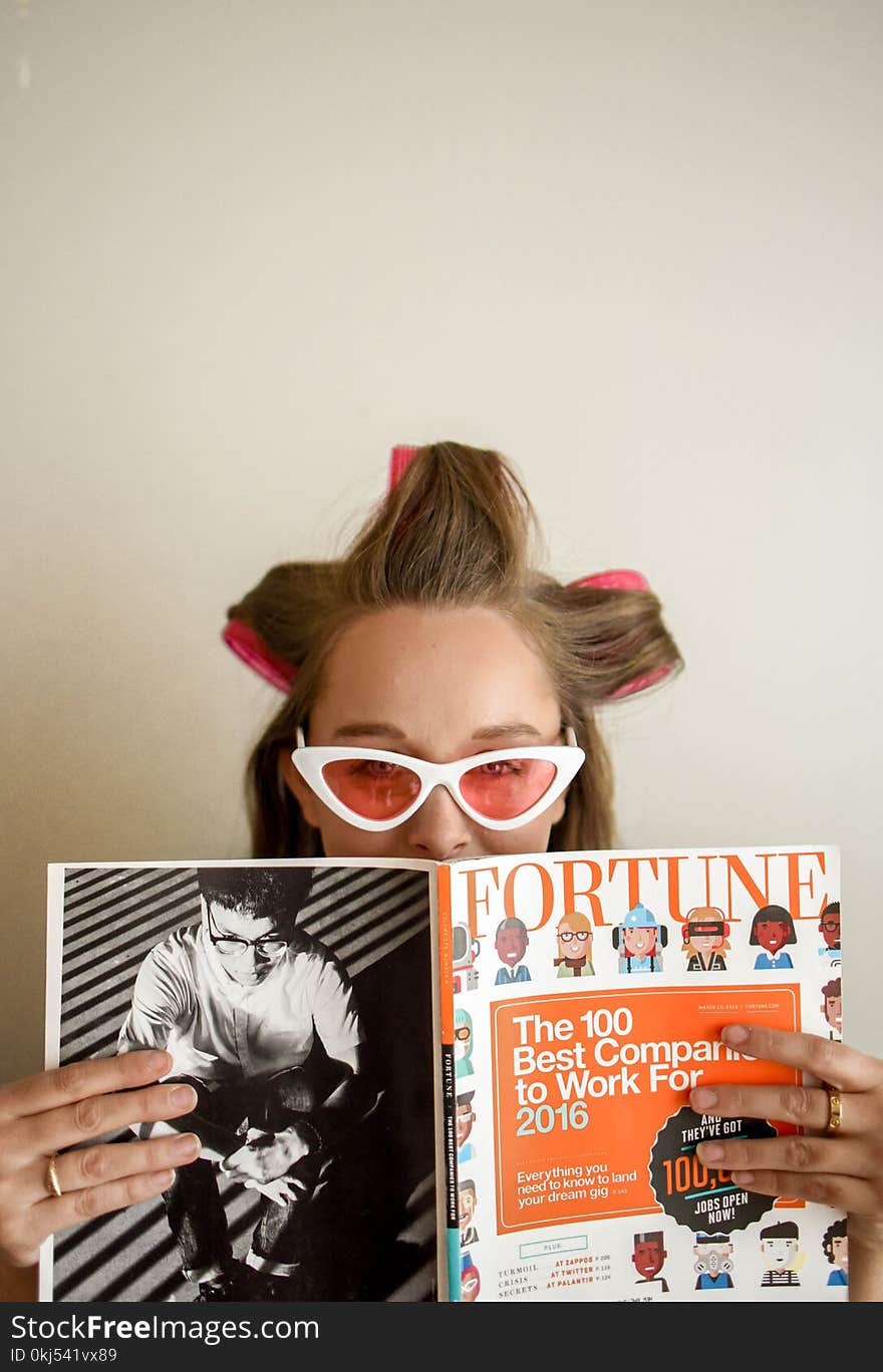 Person Holding Fortune Book