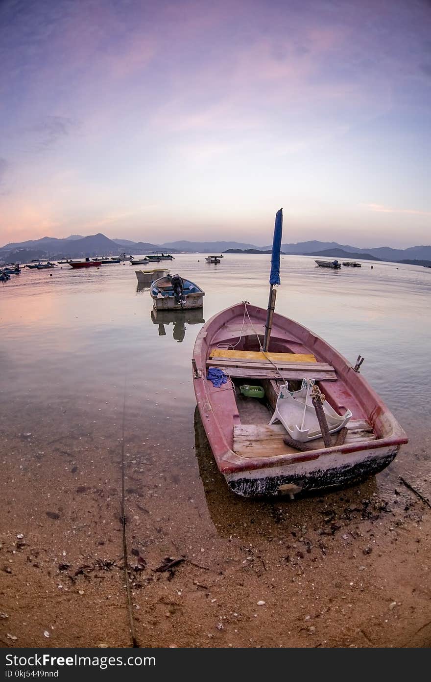 Closeup Photo of White and Blue Boat