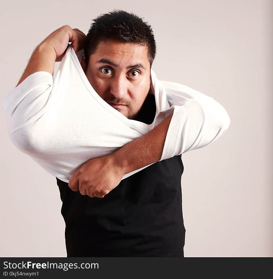 Man Wearing Black and White Shirts