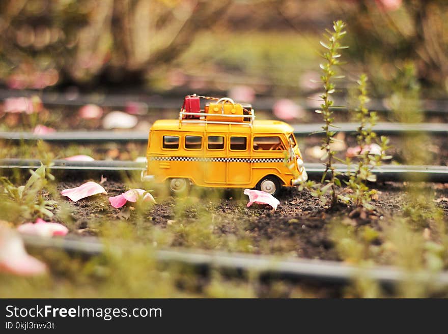 Tilt Shift and Selective Color Photo of White Van Miniature