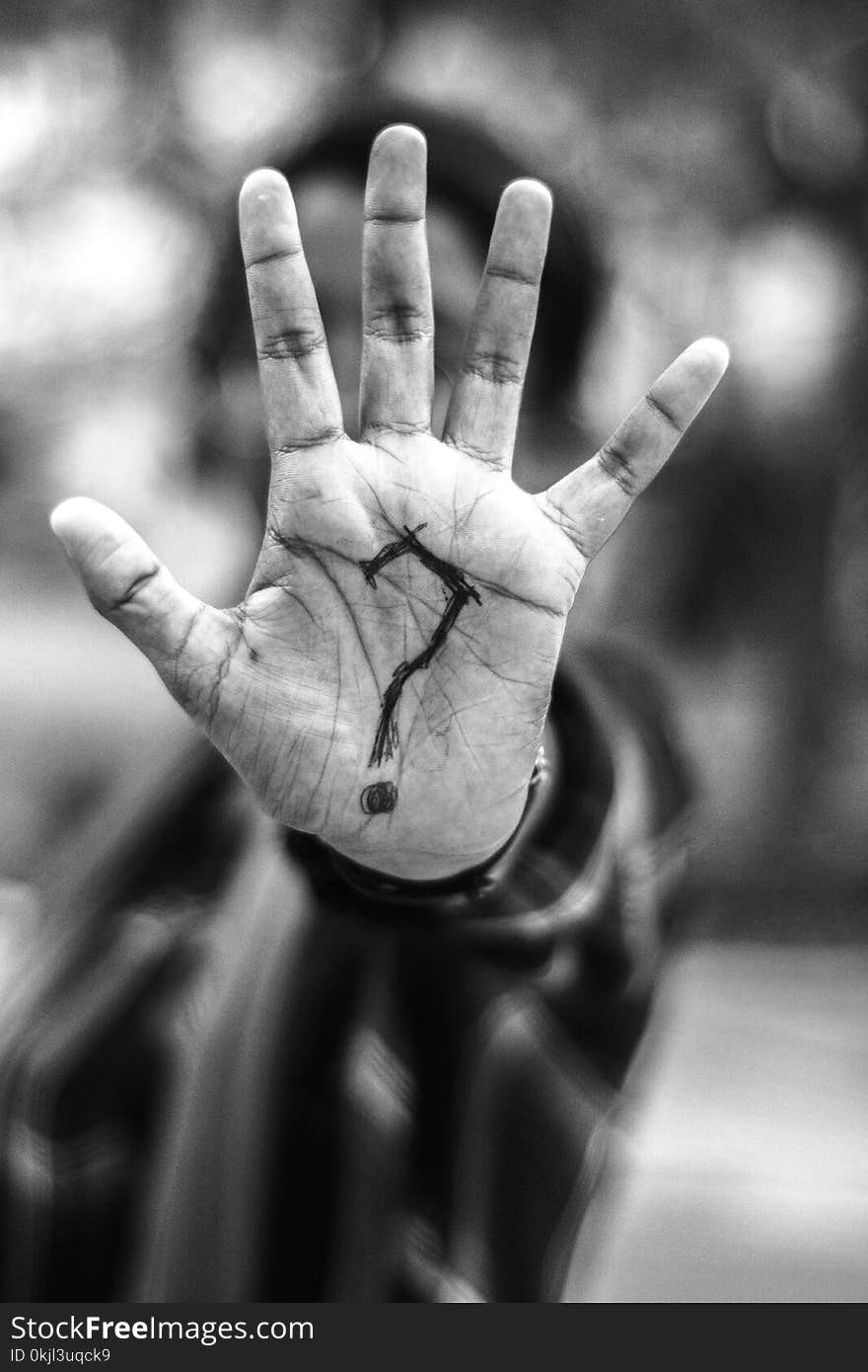 Person With Question Mark on His Palm