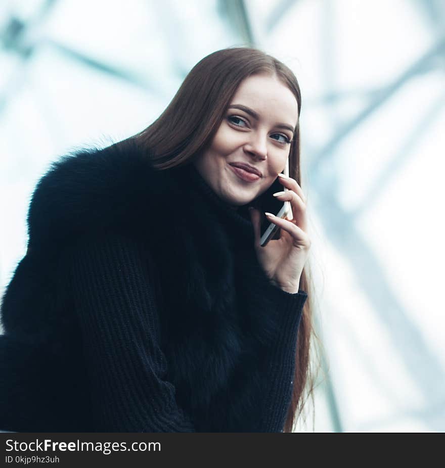 Winter Beautiful woman city portrait cold time. Outdoor shot.