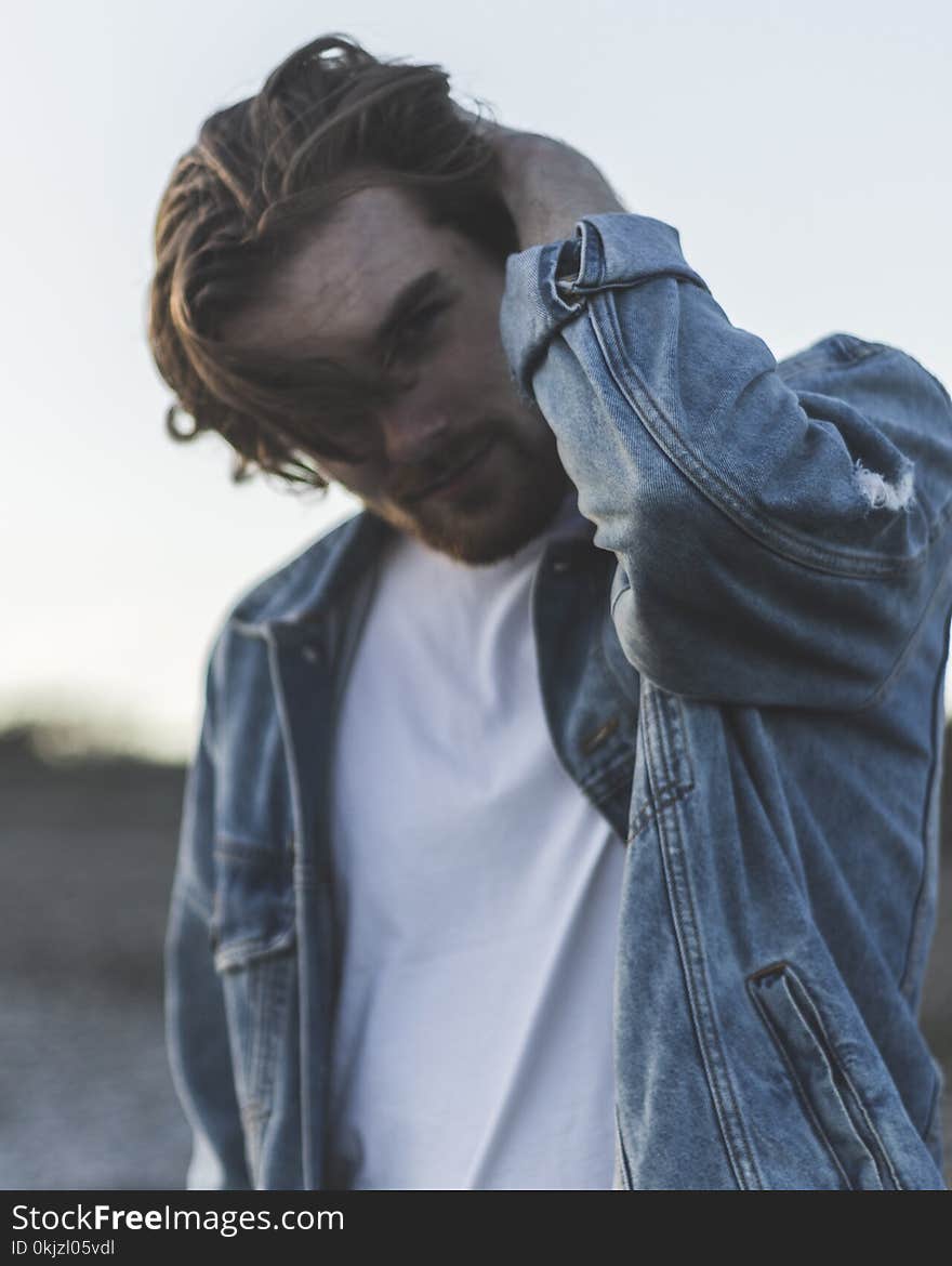 Man in Blue Denim Jacket