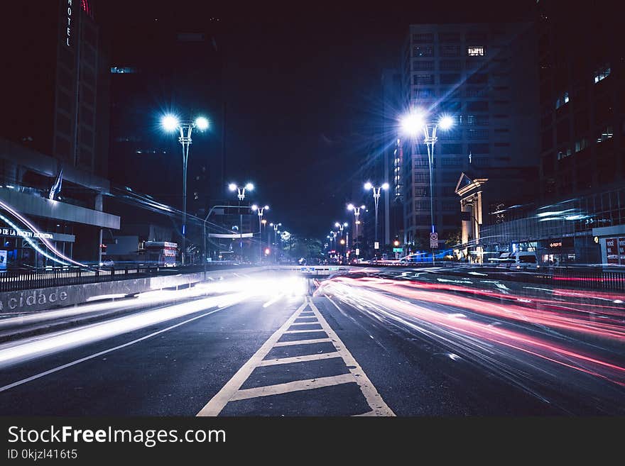 Gray Concrete Road Near Buildings