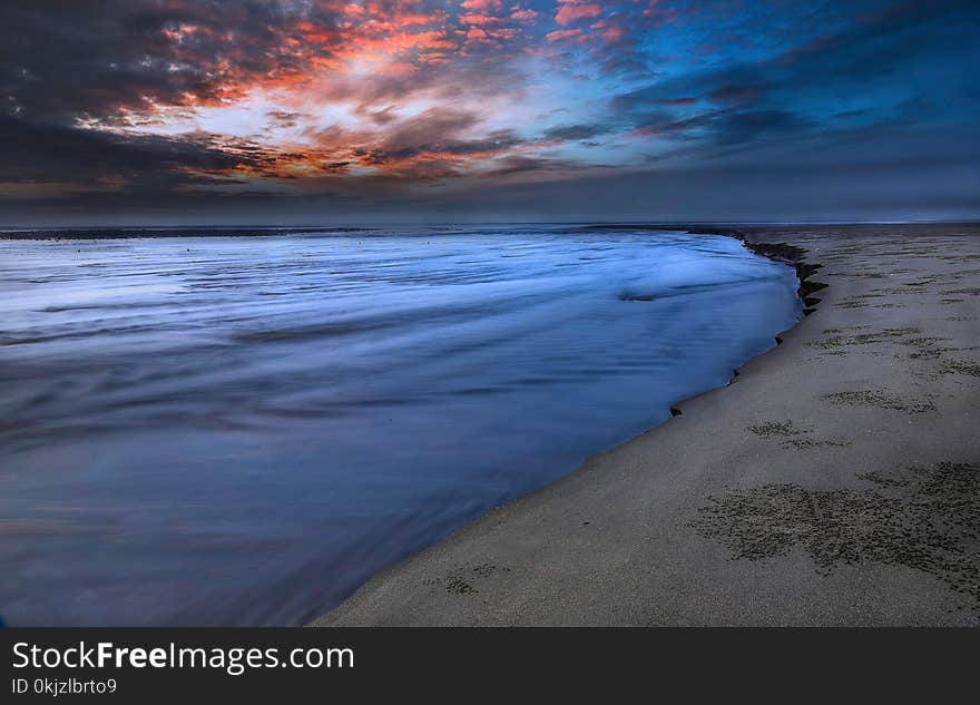 Seashore Under Blue Sky Photography