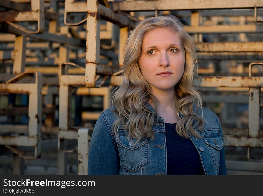 Woman Wearing Blue Denim Jacket