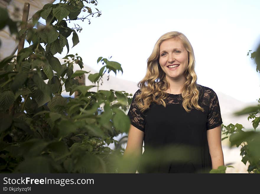 Photo of Woman Wearing Black Outfit