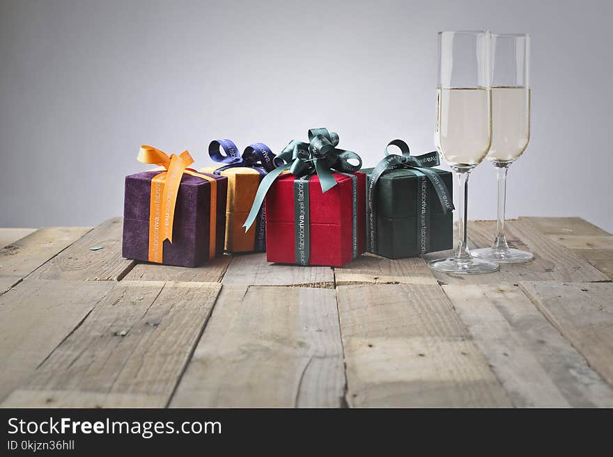 Five Assorted Gift Boxes and Two Flute Glasses