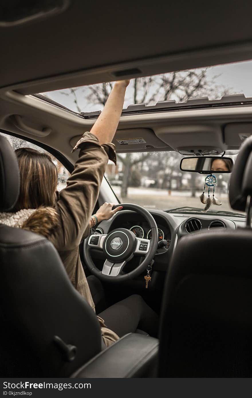 Photo of Woman Driving Car