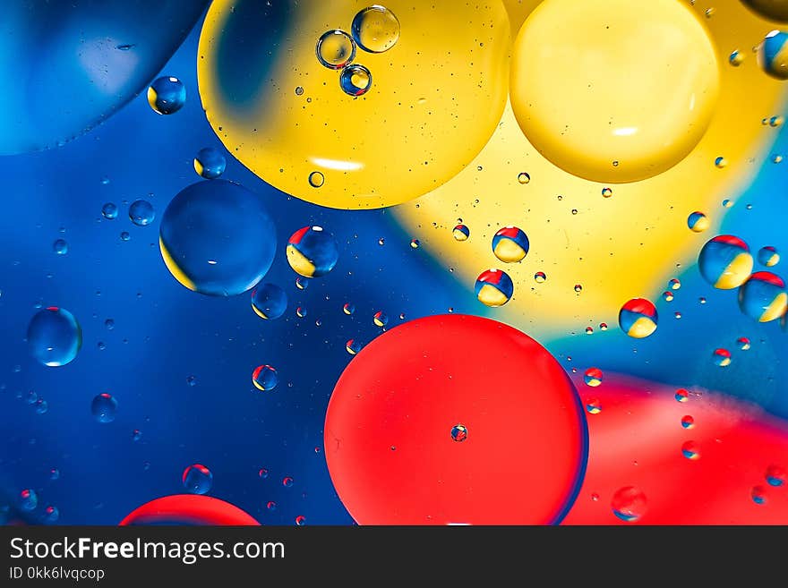 Colorful background from water drops and oil