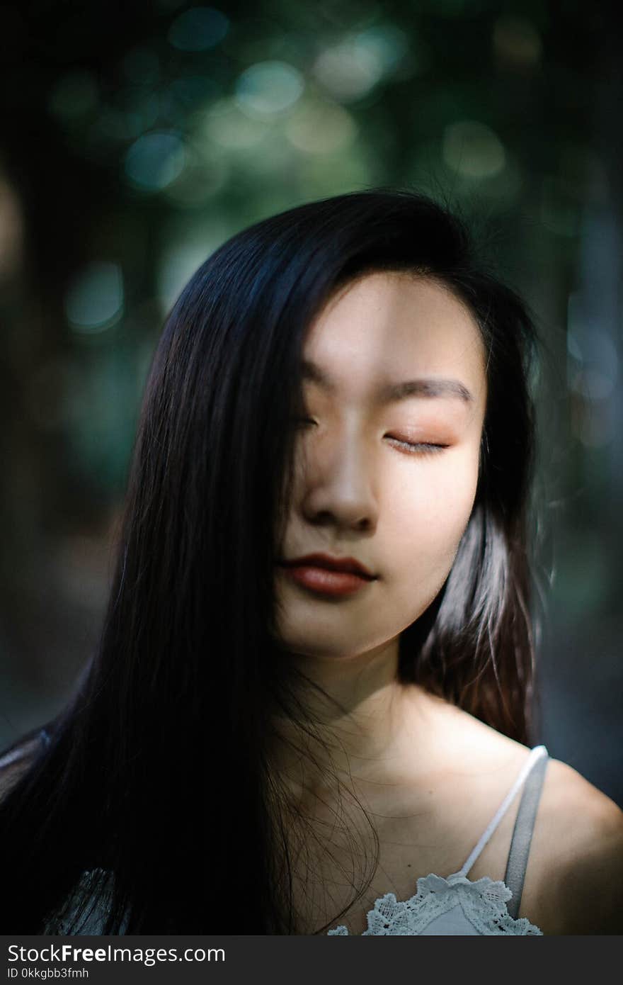 Close-Up Photography of a Woman With Closed Eyes