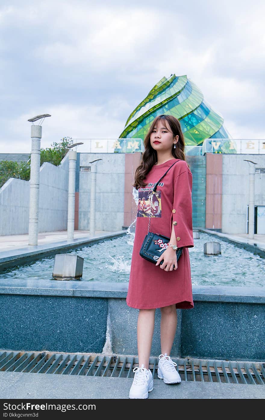 Woman in Front of Body of Water