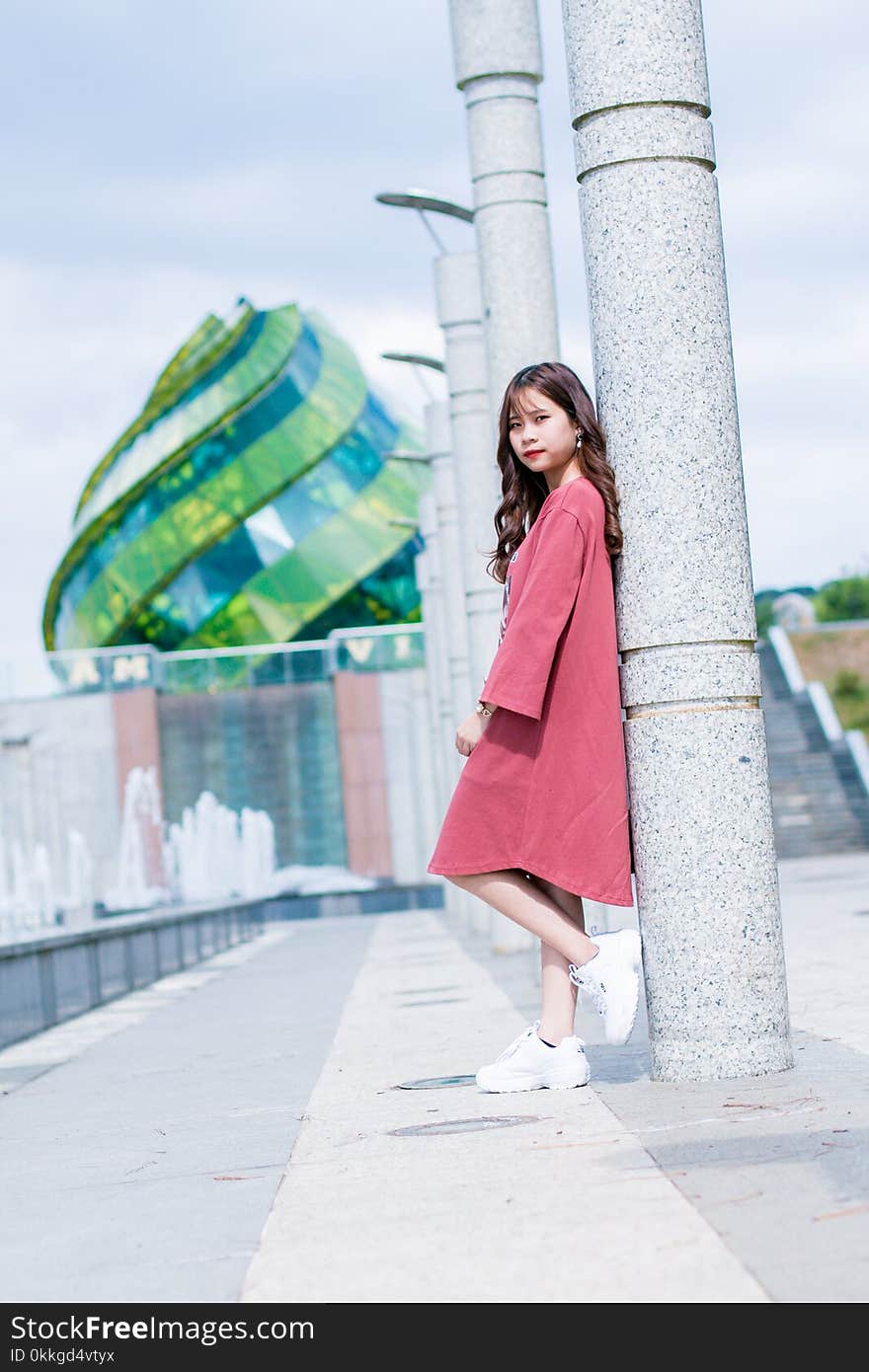 Woman Wearing Red Long-sleeved Dress