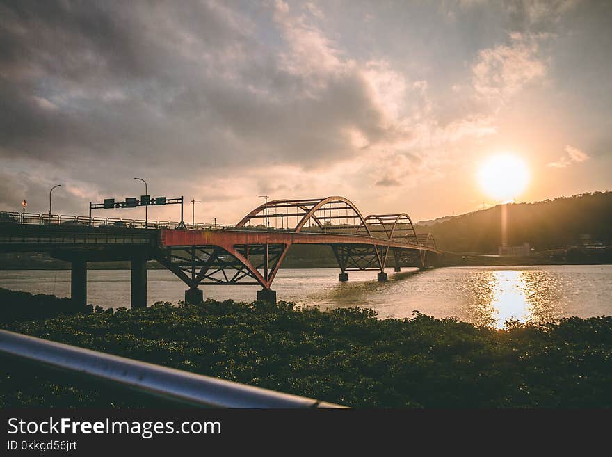 Landscape Photo of Bridge Near Body of Water