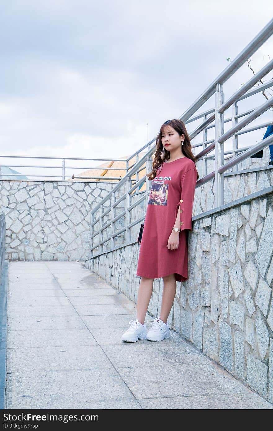 Woman Wearing Pink Long-sleeved Dress