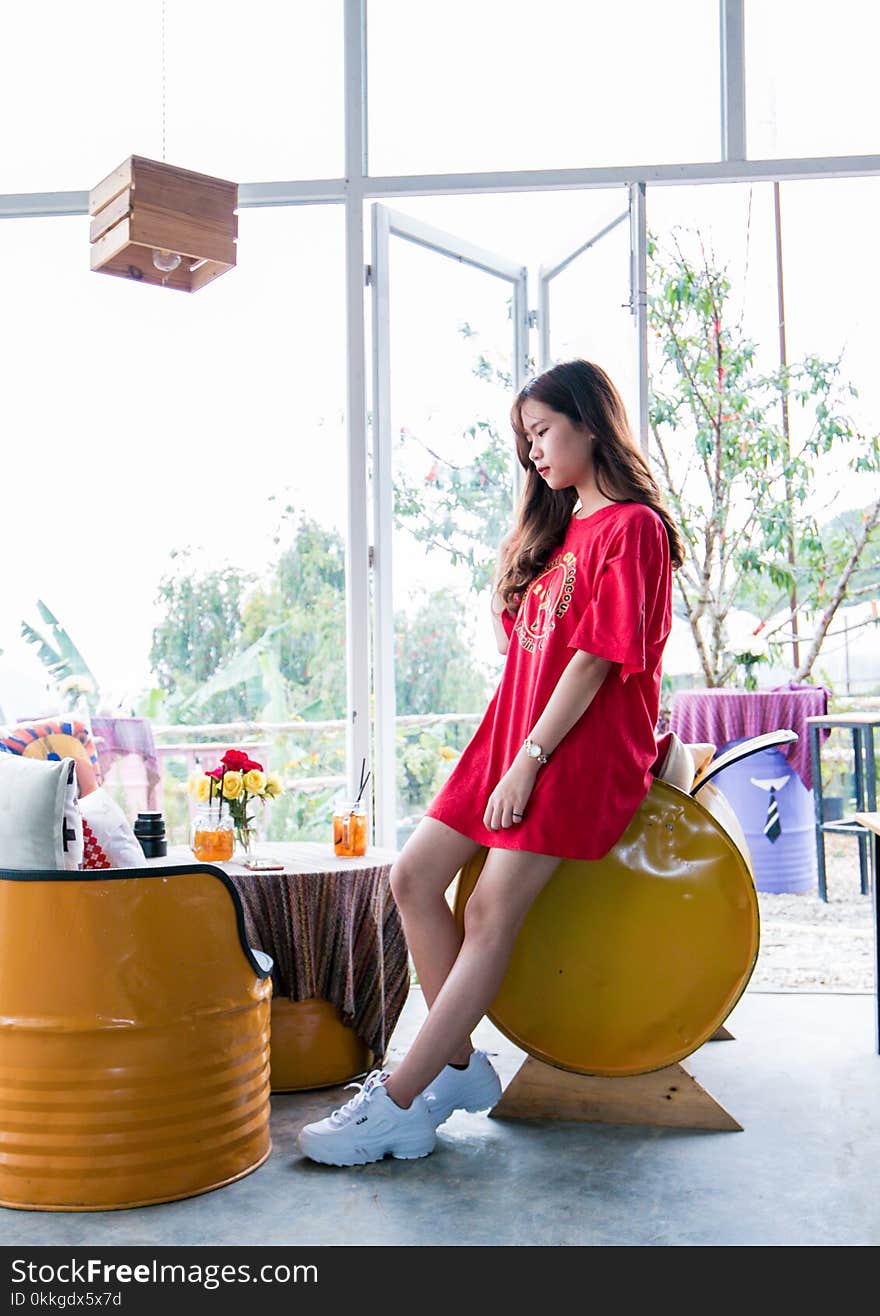 Woman Wearing Red Short-sleeved Dress