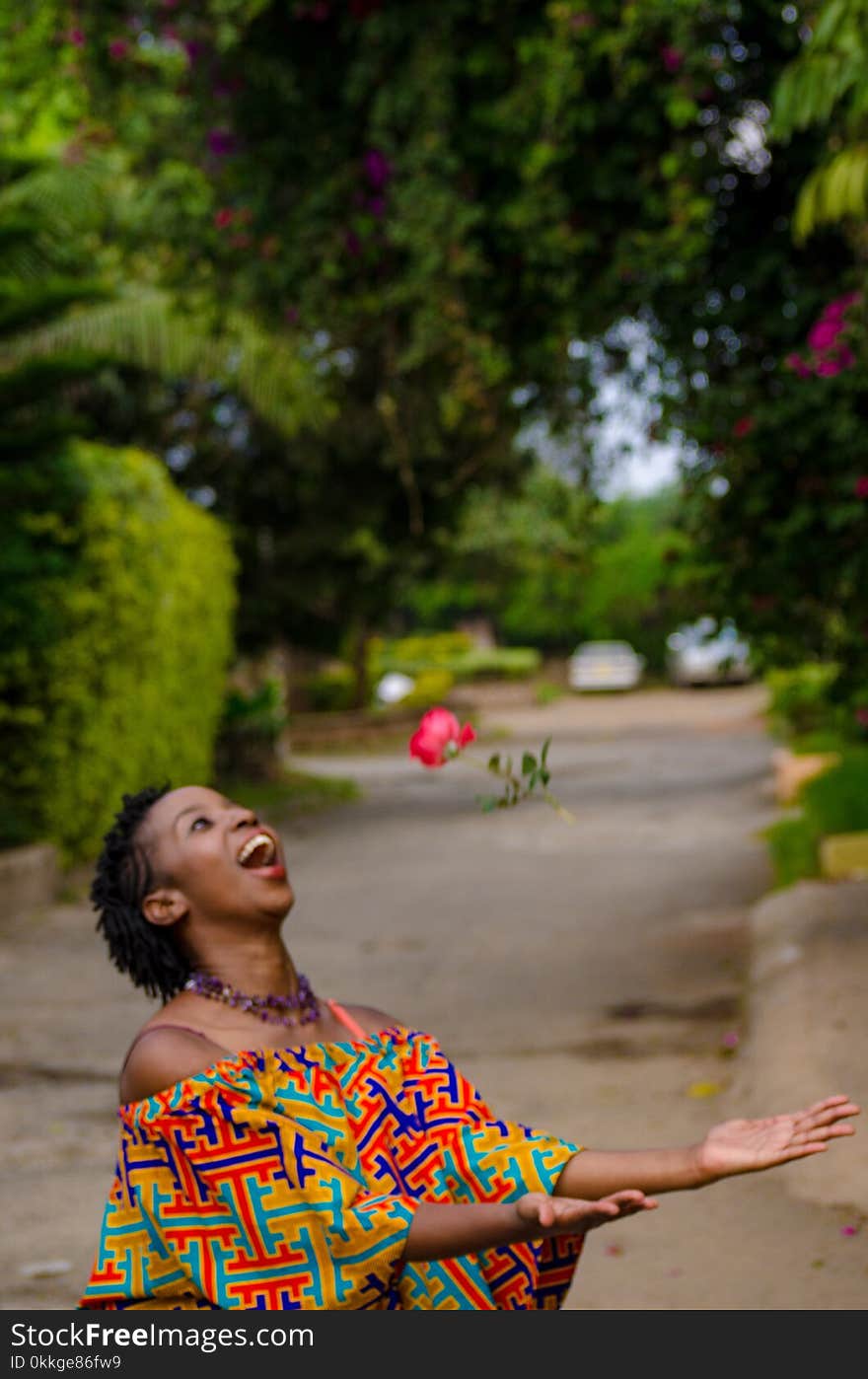 Woman Catching Pink Flwoer