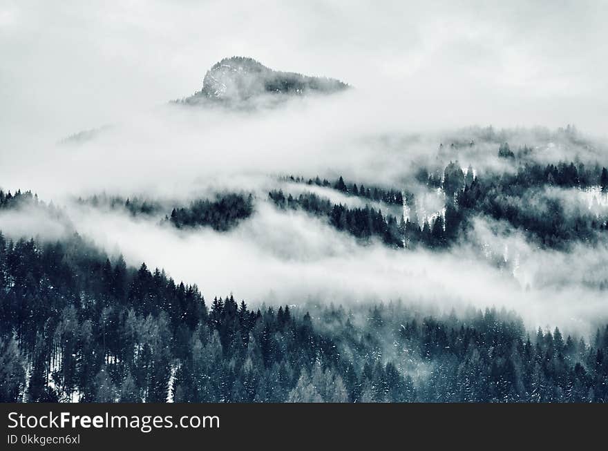 High Angle Photo of Mountain Cover With Clouds