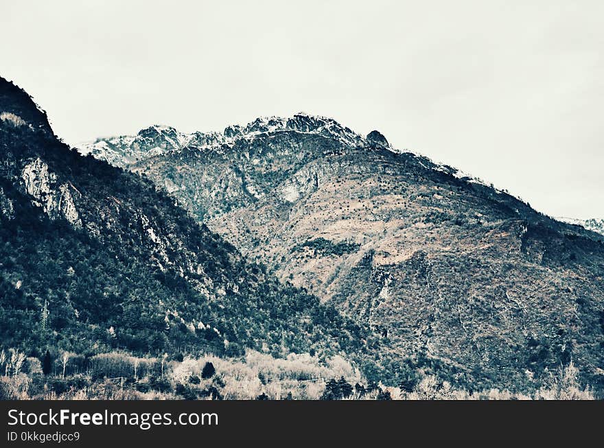 Green and White Mountain Photo at Daytime