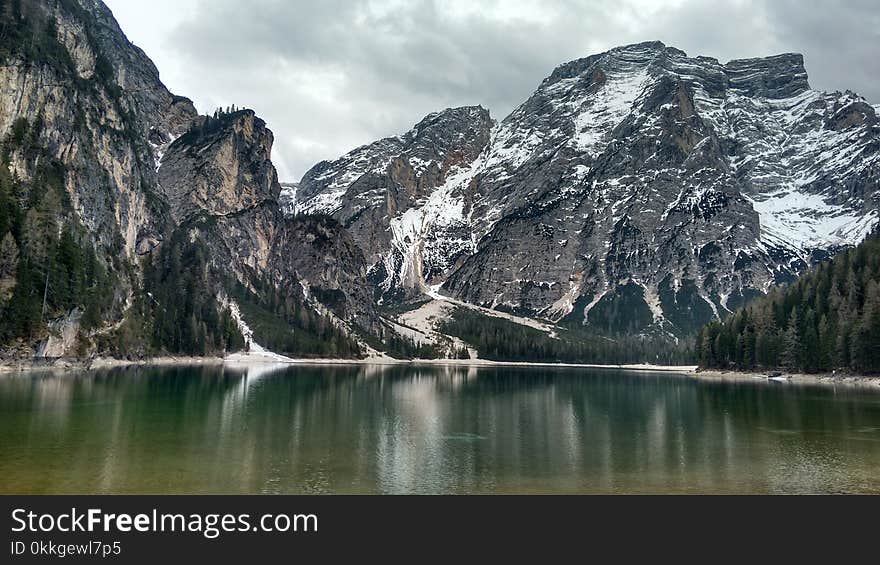 Snow Mountain Under Gray Cloudy Sky