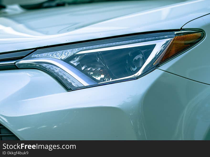 Close-Up Photography of Car Headlight