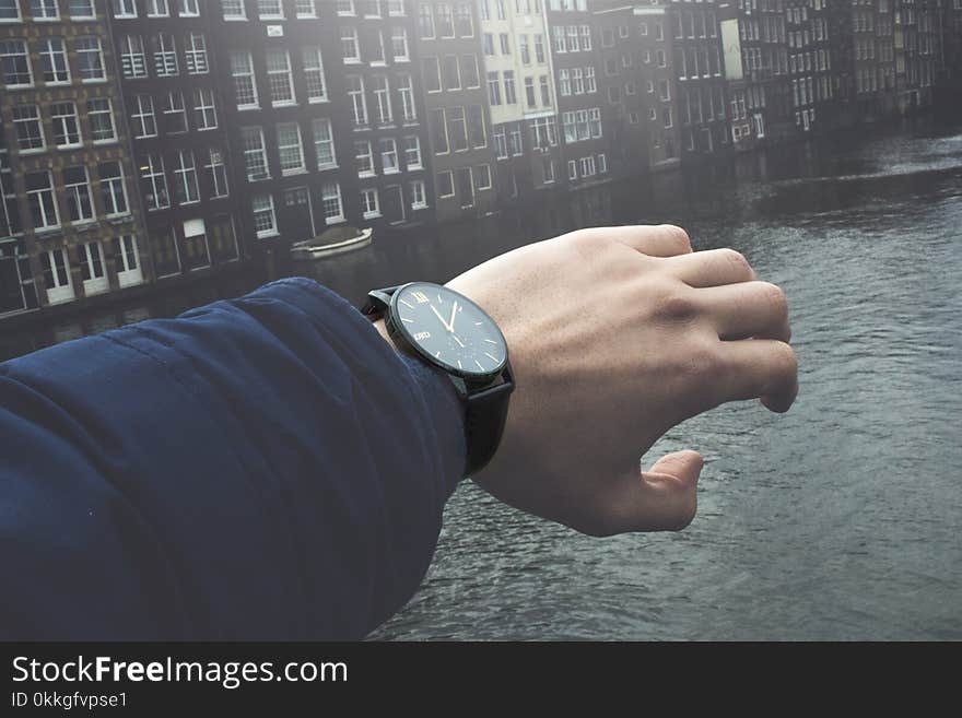 Close-Up Photography of a Person Wearing Wristwatch