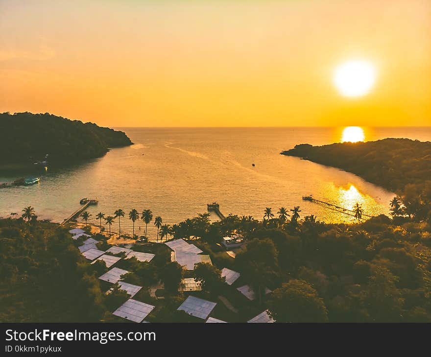 Aerial view of sea and beach with coconut palm tree on island