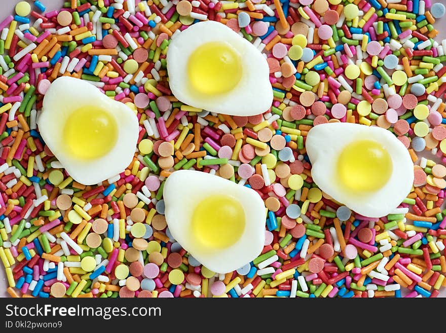 Four Sunny Side Up Egg Miniatures on Assorted-color Candies