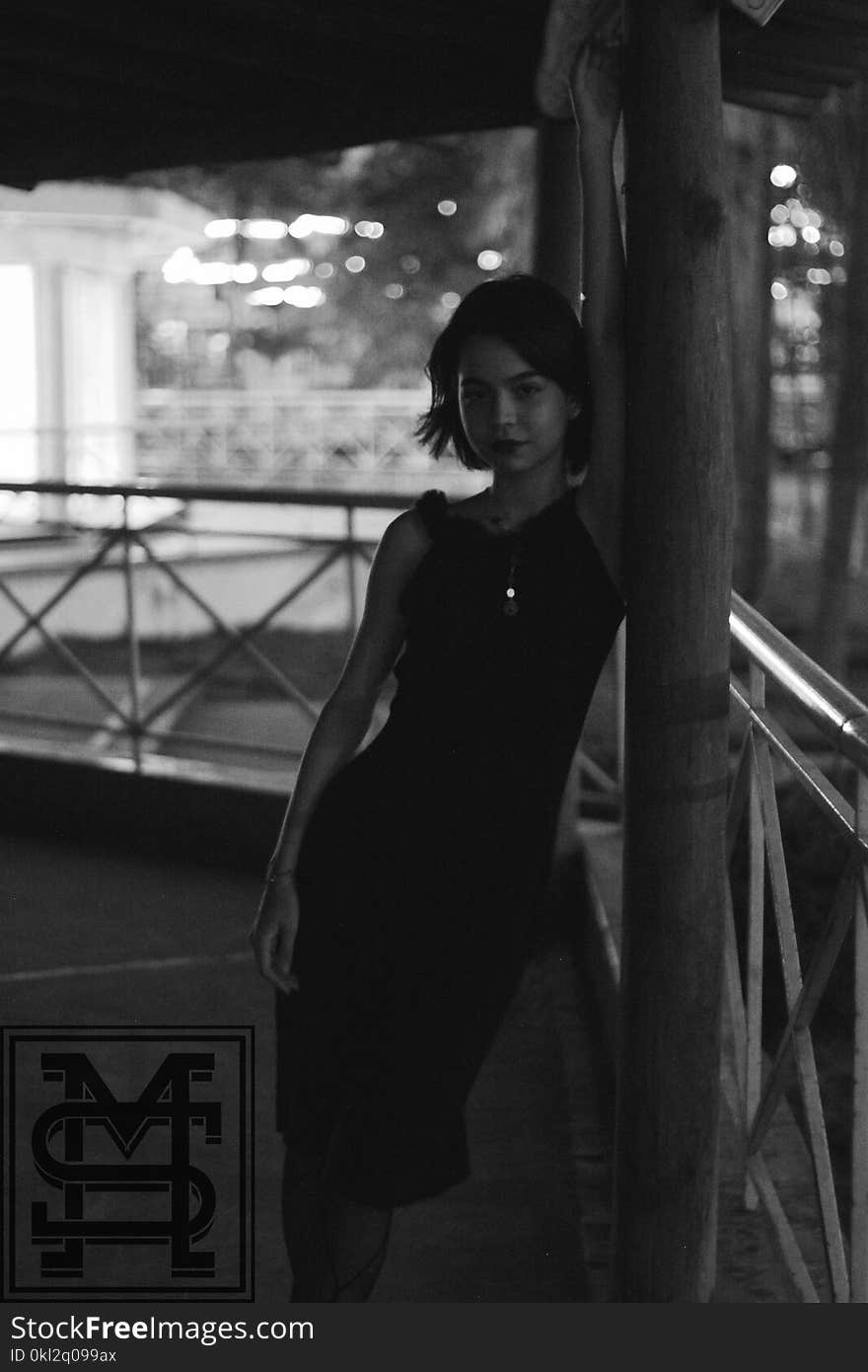 Monochrome Photography of Woman Wearing Black Dress