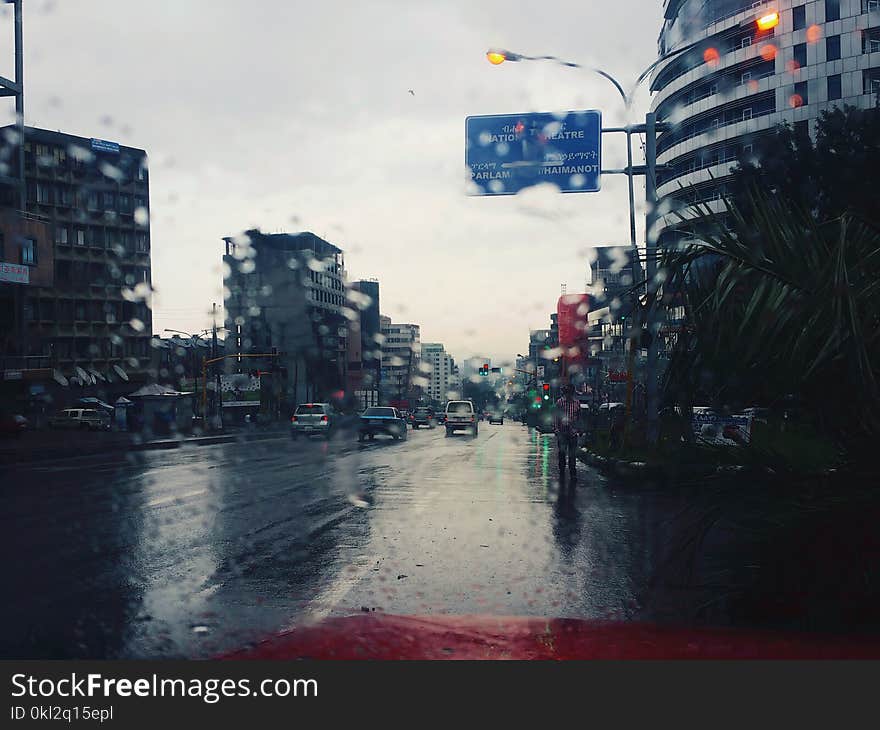 White High-rise Building in Front of Street