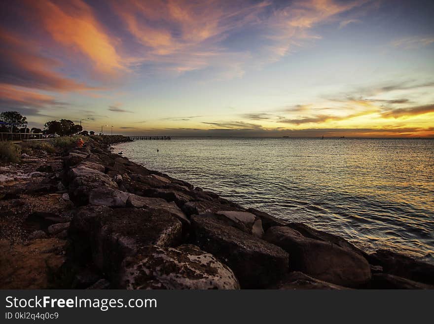 Scenic View of Ocean During Dawn