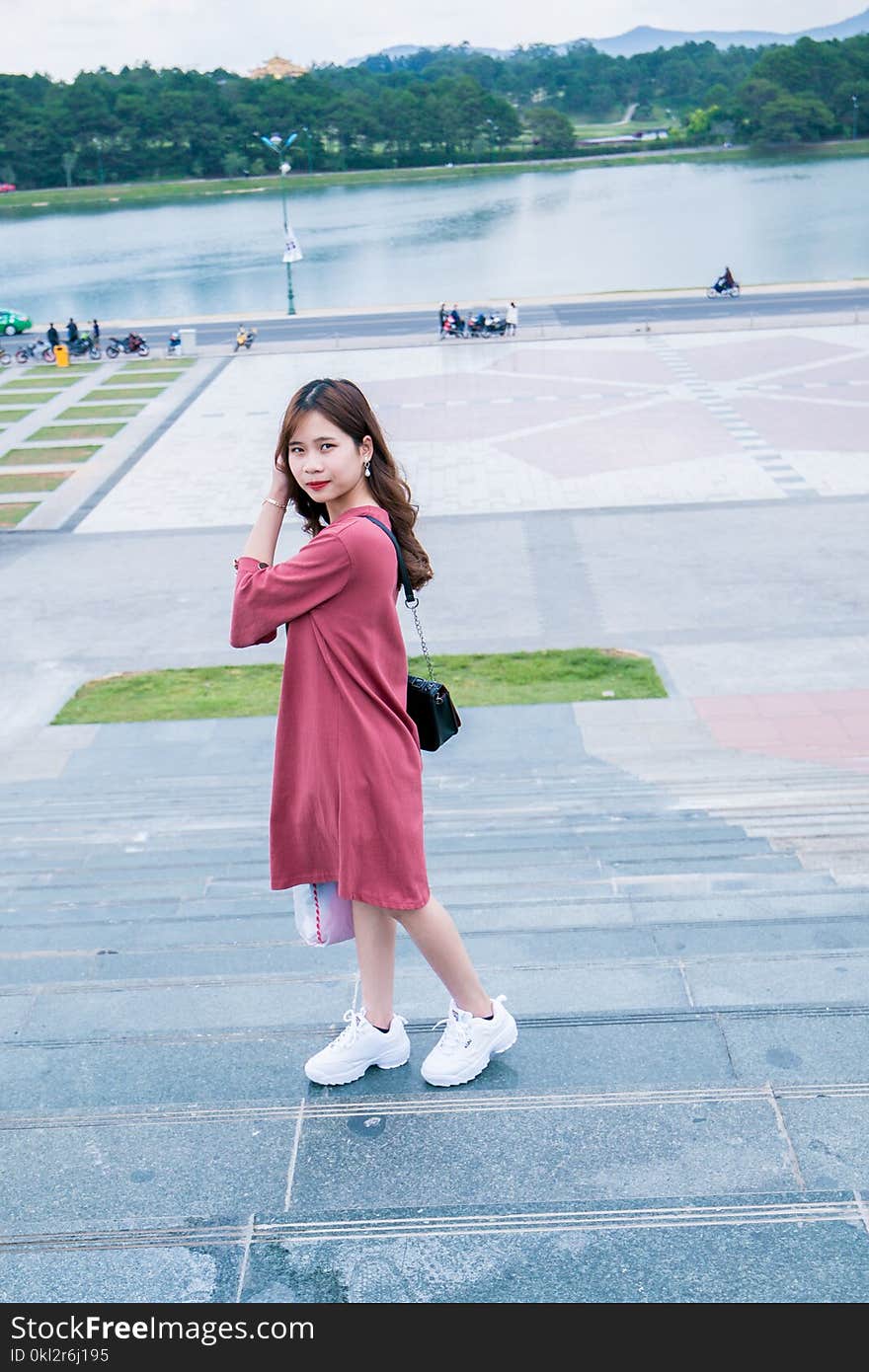 Woman Wearing Pink 3/4-sleeved Midi Dress