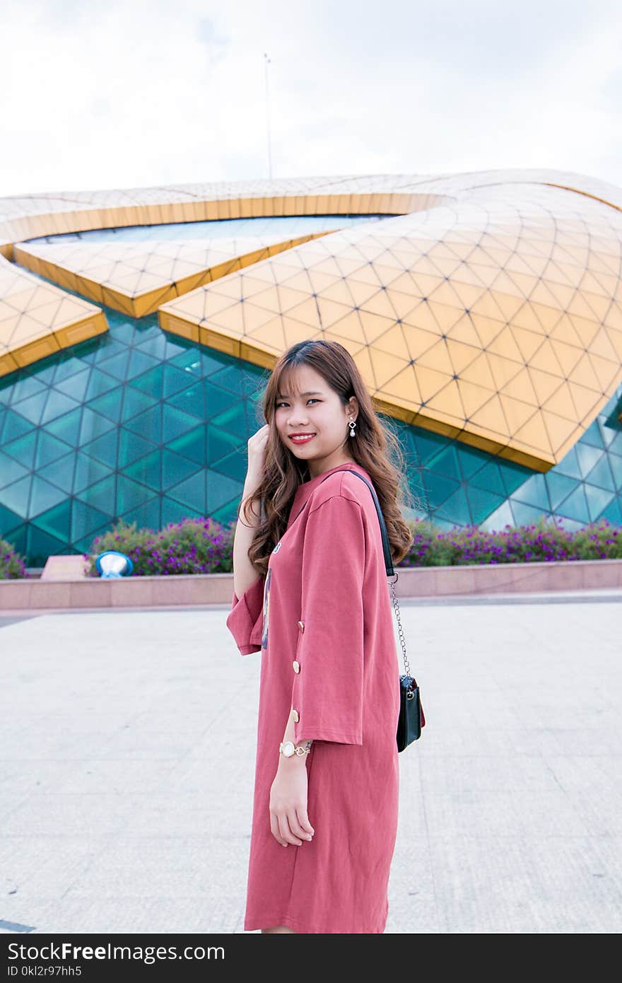 Woman in Pink Long-sleeved Dress