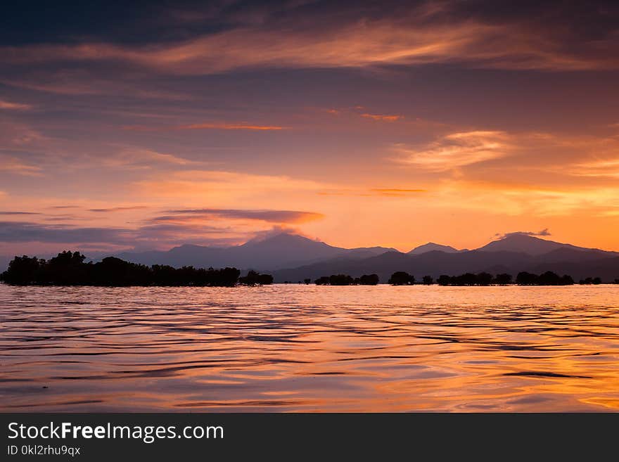 Photo of Calm Sea during Golden Hour