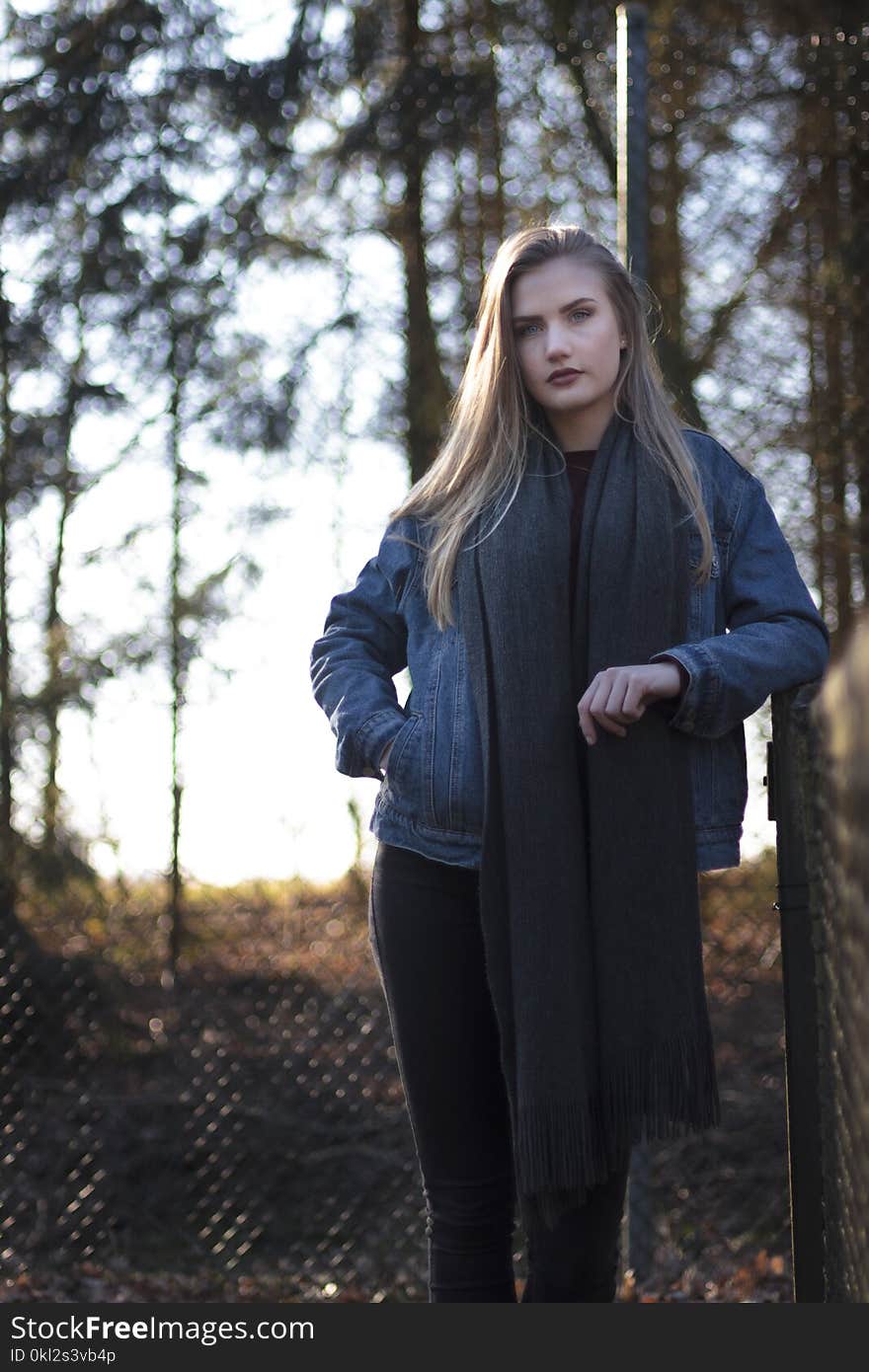 Woman in Blue Denim Jacket Standing