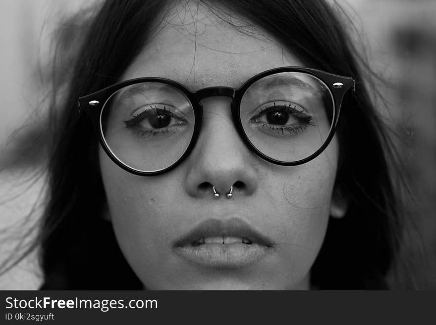 Closeup Photo of Woman Wearing Eyeglasses