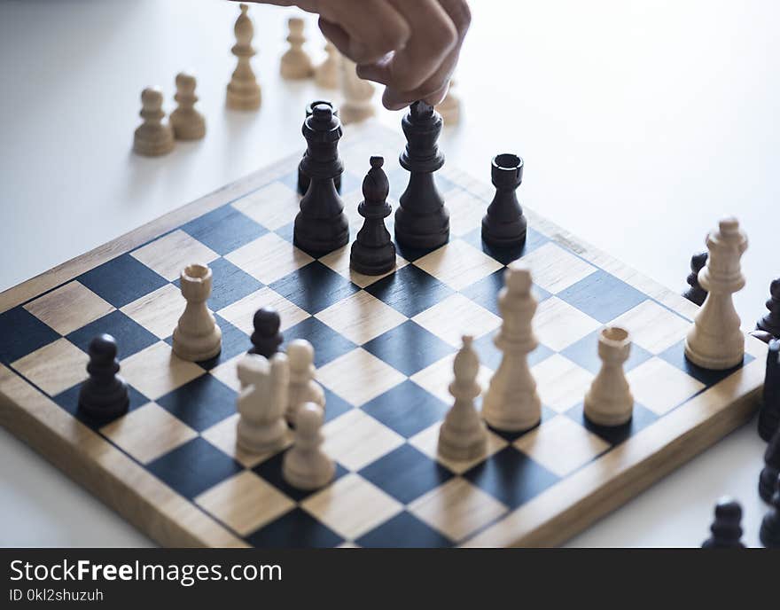 White and Black Chessboard With Pieces