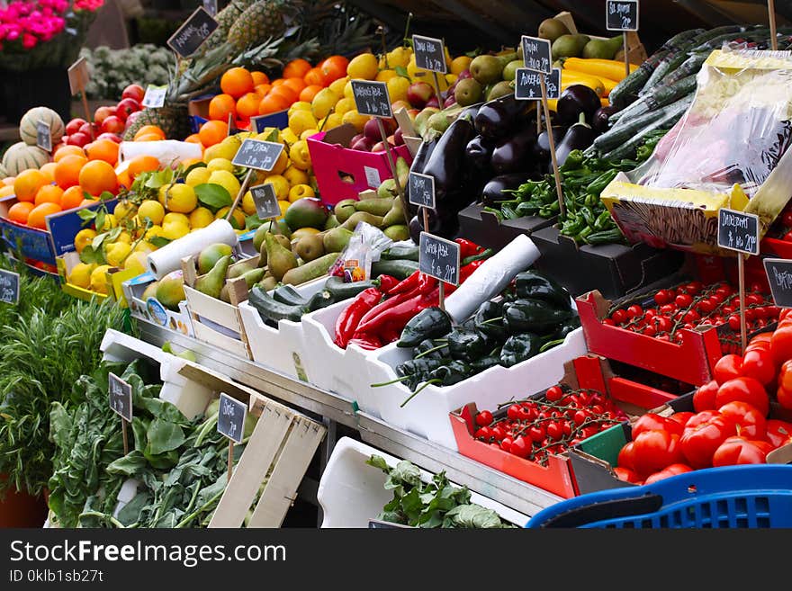 Fresh fruit and vegetables for sale at a street market, rhubarbs