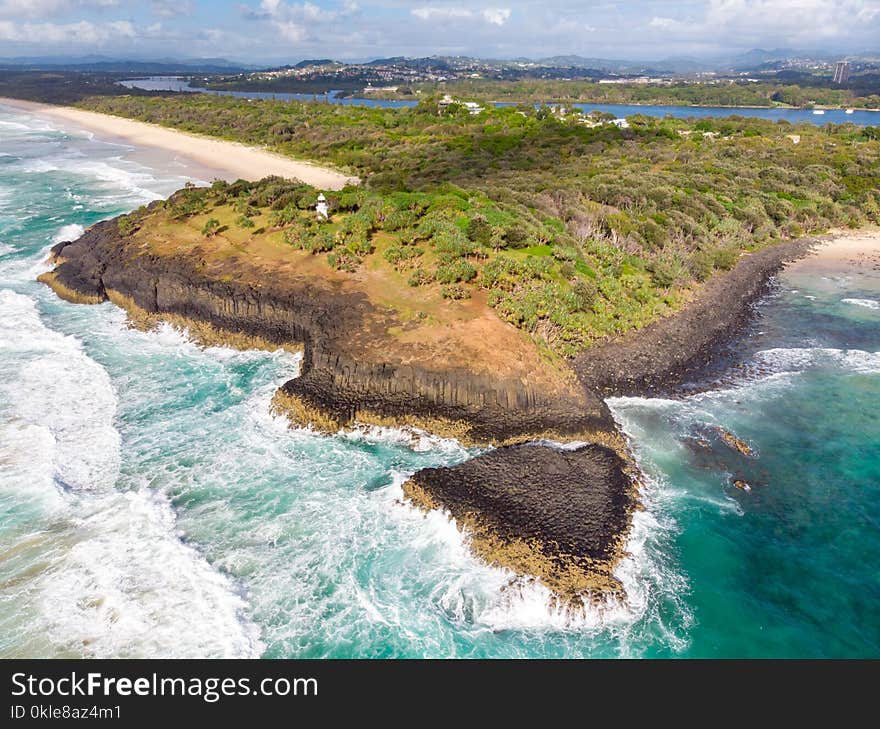 A view over Fingal Head and Fingal Head Causeway near the Gold Coast in Queensland, Australia. A view over Fingal Head and Fingal Head Causeway near the Gold Coast in Queensland, Australia