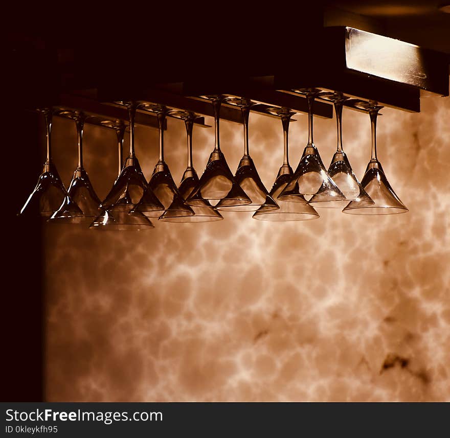 Beautiful Hanging Wine Glasses Of A Bar Isolated Photograph