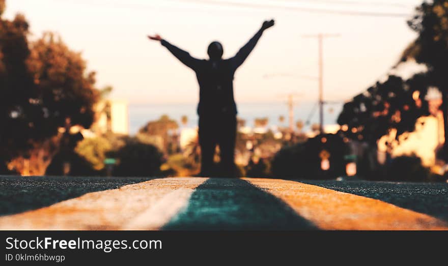 Silhouette of Person during Sunset