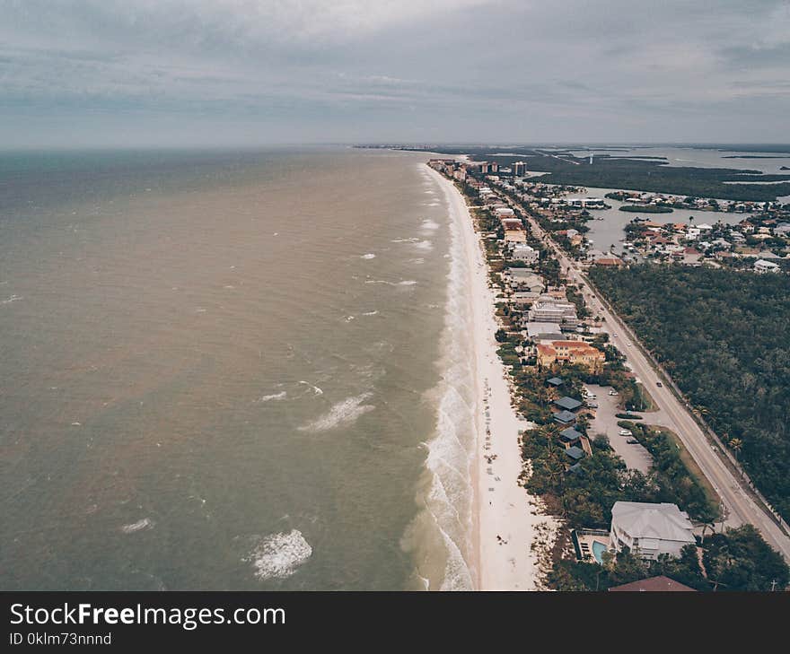 High Angle Photography of Body of Water and Landscape