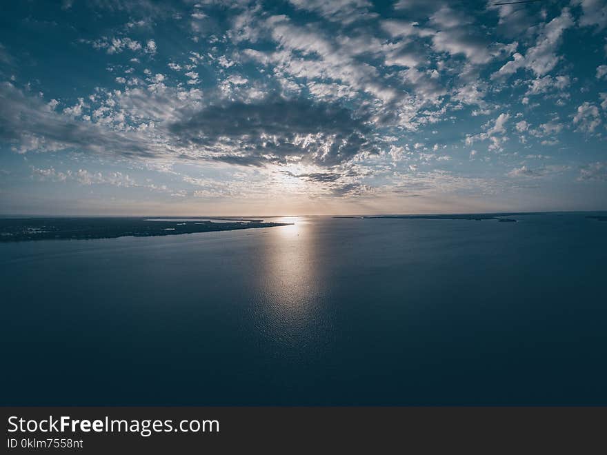 Blue Sea Photography during Sunset