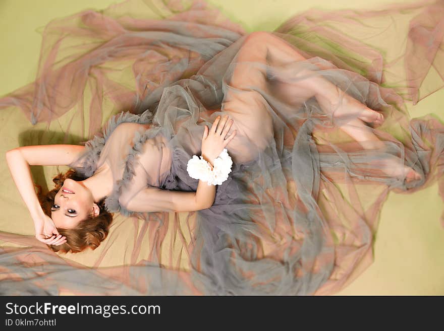 Woman Wearing Grey and Brown Mesh Dress