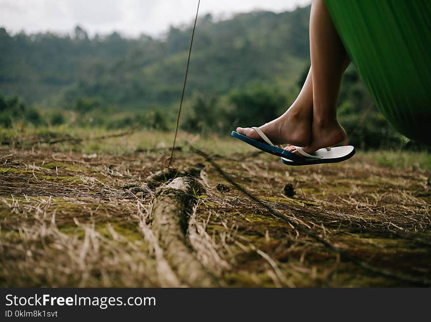 Person Wearing Flip-flops