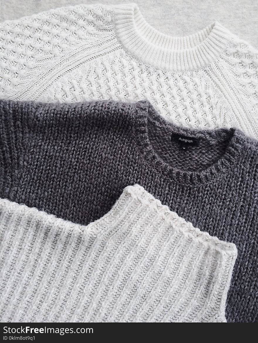 Close-up Photo of Three Sweatshirts