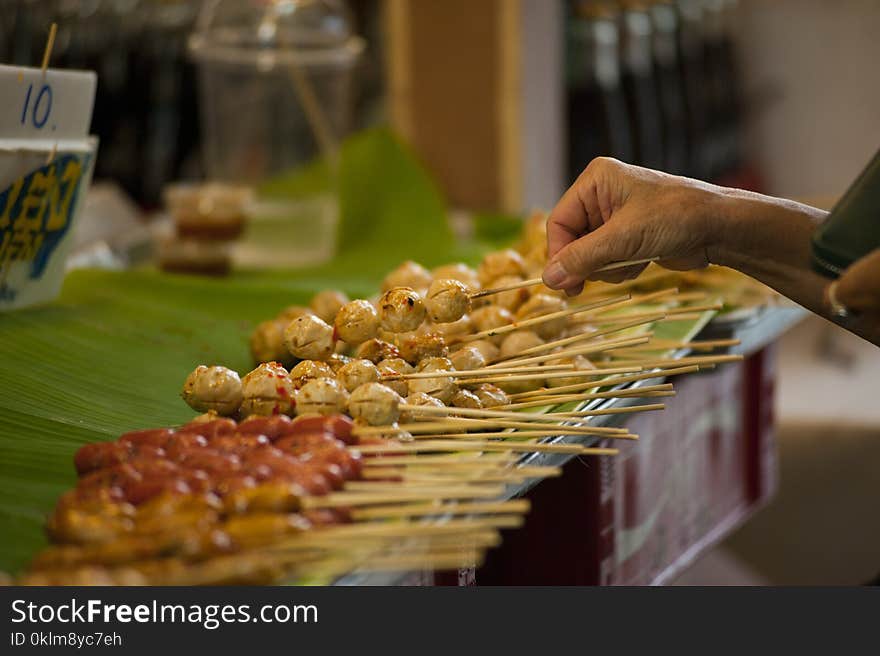 Tilt Shift Photography of Street Foods in Stick