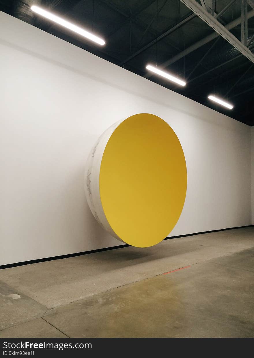 Yellow and White Bowl on Wall